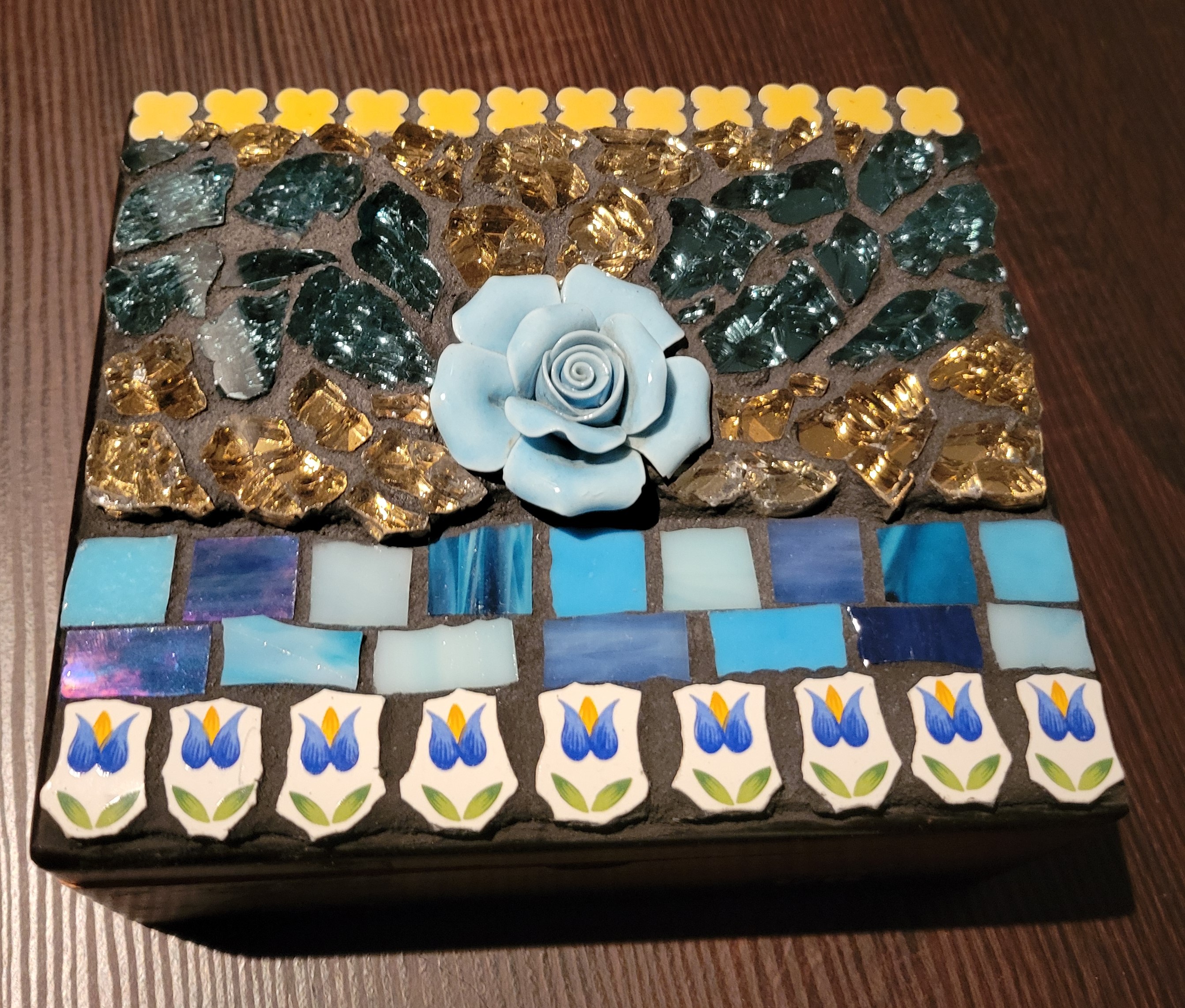 A cigar box turned into a jewelry box.  My sister loved it so much, that I gave it to her.